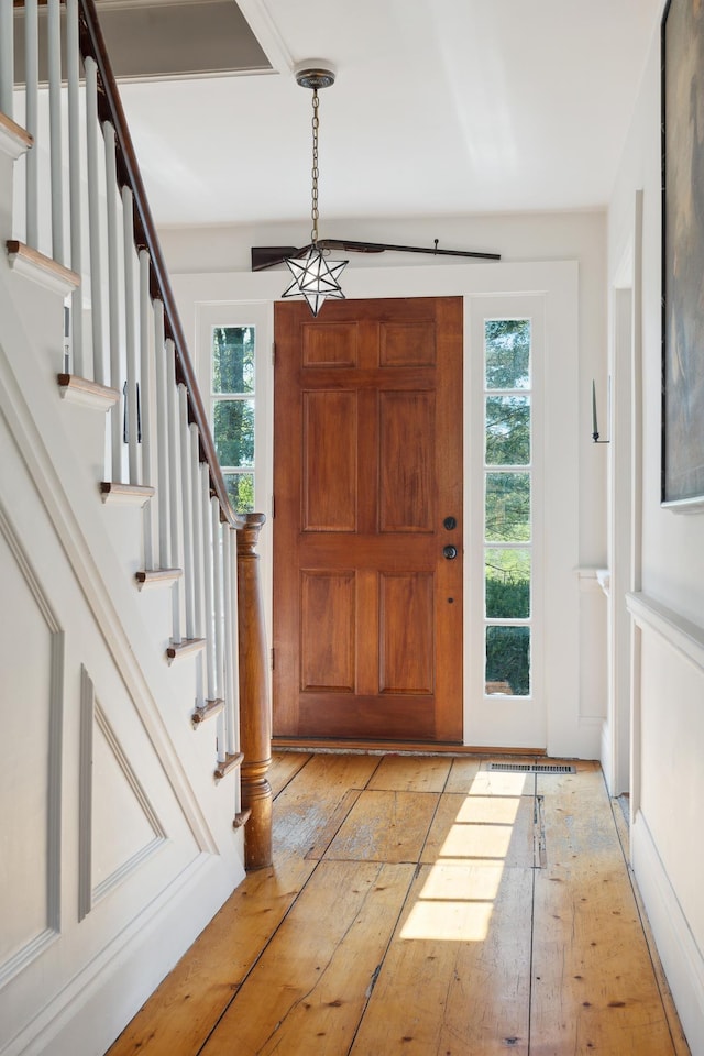 9671 Vt Route 12, Barnard, VT 05031 - entrance foyer featuring stairway and light wood-type flooring