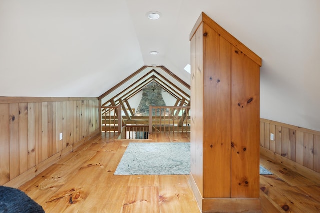9671 Vt Route 12, Barnard, VT 05031 - additional living space with wood finished floors, wooden walls, lofted ceiling, and wainscoting