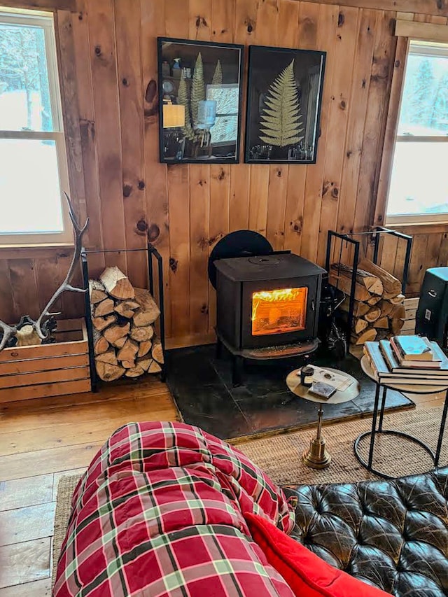 9671 Vt Route 12, Barnard, VT 05031 - detailed view of wood walls, wood finished floors, and a wood stove