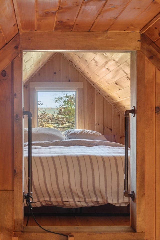 9671 Vt Route 12, Barnard, VT 05031 - bedroom with vaulted ceiling, wood ceiling, and wooden walls