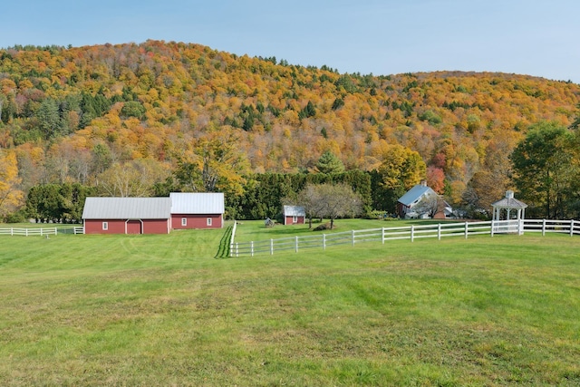 9671 Vt Route 12, Barnard, VT 05031 - view of yard with a view of trees, an outbuilding, a rural view, and a gazebo