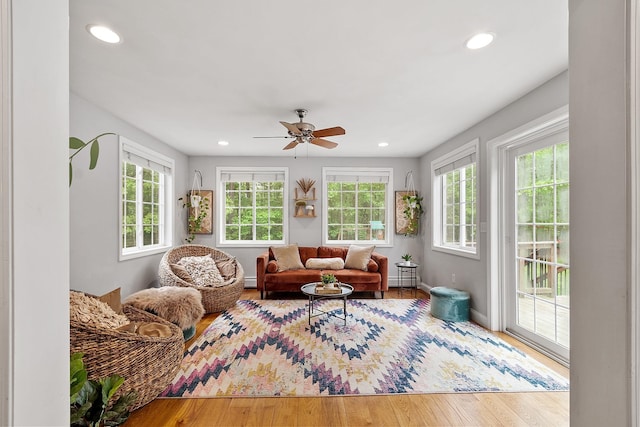 24 Stonewall Dr, Milford, NH 03055 - living area featuring healthy amount of natural light, recessed lighting, wood finished floors, ceiling fan, and baseboards