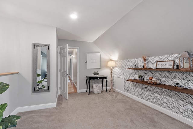 24 Stonewall Dr, Milford, NH 03055 - interior space with light colored carpet, baseboards, lofted ceiling, and an accent wall