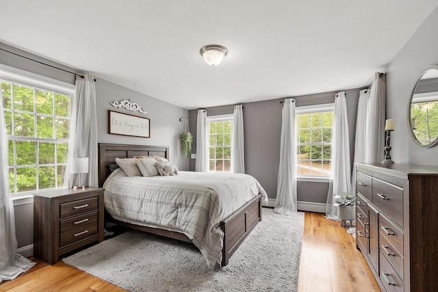 24 Stonewall Dr, Milford, NH 03055 - bedroom with light wood-style flooring