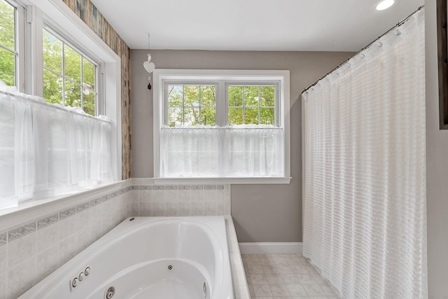 24 Stonewall Dr, Milford, NH 03055 - full bathroom with a tub with jets and baseboards