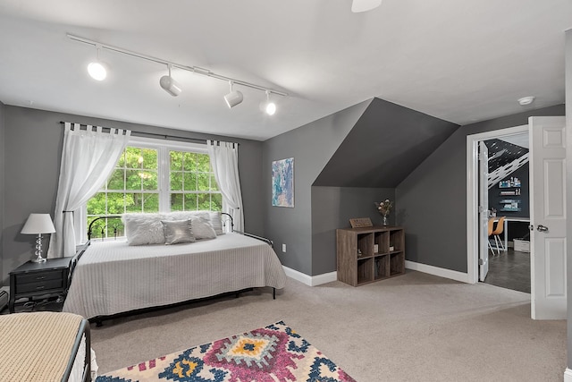 24 Stonewall Dr, Milford, NH 03055 - bedroom featuring track lighting, light colored carpet, and baseboards