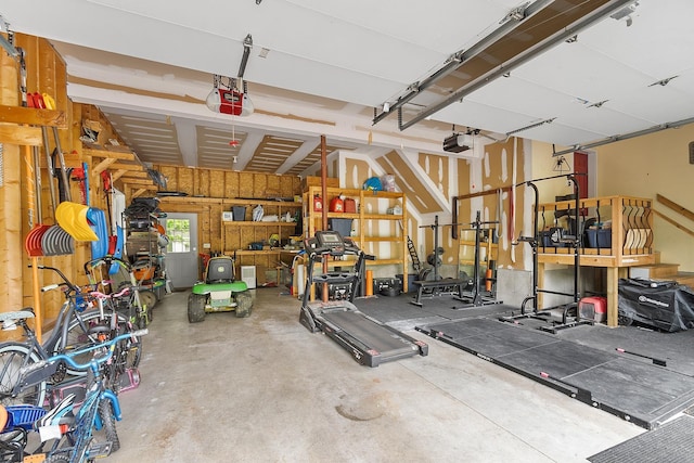 24 Stonewall Dr, Milford, NH 03055 - garage featuring a garage door opener