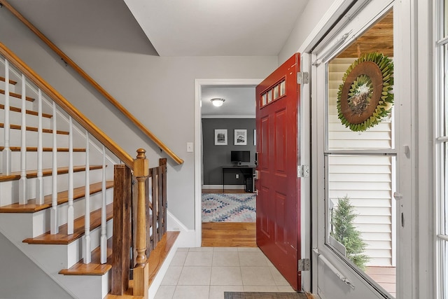 24 Stonewall Dr, Milford, NH 03055 - entryway with light tile patterned floors and stairs