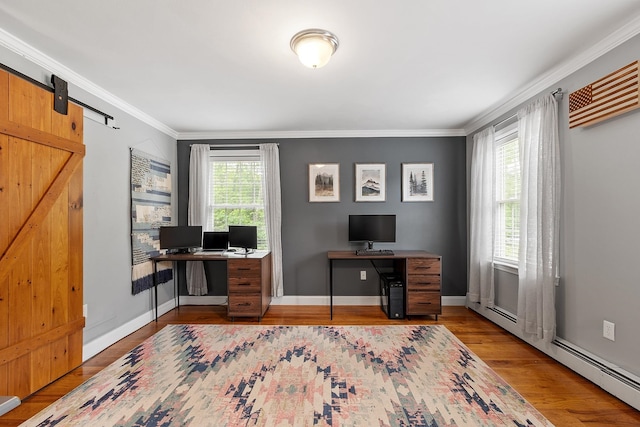 24 Stonewall Dr, Milford, NH 03055 - office featuring wood finished floors, crown molding, baseboards, and a barn door