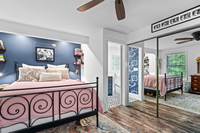 31 Henderson Rd Unit 17, Gilford, NH 03249 - bedroom featuring wood finished floors, a ceiling fan, and a closet