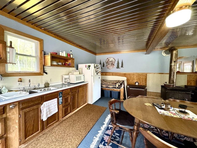 106 Philbrook Rd, Pittsburg, NH 03592 - kitchen featuring white appliances, a sink, brown cabinetry, light countertops, and wooden ceiling