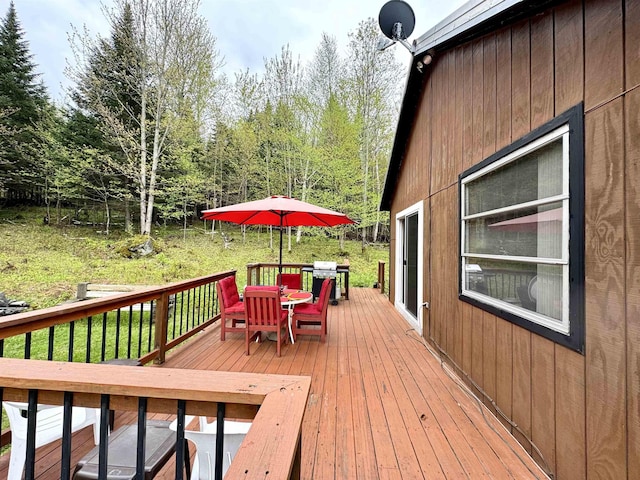 106 Philbrook Rd, Pittsburg, NH 03592 - wooden deck with outdoor dining area