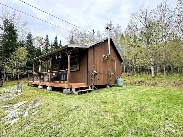 106 Philbrook Rd, Pittsburg, NH 03592 - view of outbuilding featuring a forest view