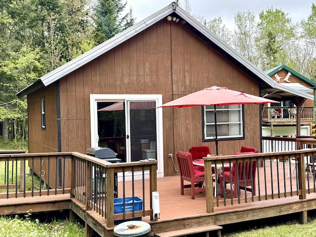 106 Philbrook Rd, Pittsburg, NH 03592 - back of house featuring a wooden deck