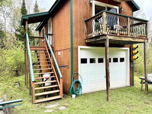 106 Philbrook Rd, Pittsburg, NH 03592 - view of side of property featuring an attached garage and stairs