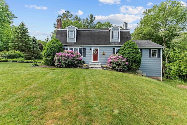 37 Forest St, Londonderry, NH 03053 - colonial inspired home featuring a chimney and a front lawn