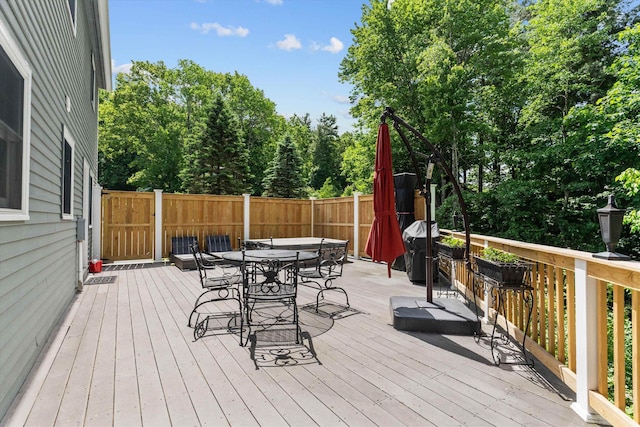 37 Forest St, Londonderry, NH 03053 - wooden deck featuring outdoor dining space and area for grilling