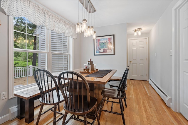 15 Fox Meadow Ln, Merrimack, NH 03054 - dining room featuring baseboard heating, plenty of natural light, and light wood-style flooring