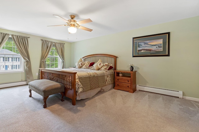 15 Fox Meadow Ln, Merrimack, NH 03054 - bedroom with a baseboard radiator, carpet floors, a ceiling fan, and baseboards
