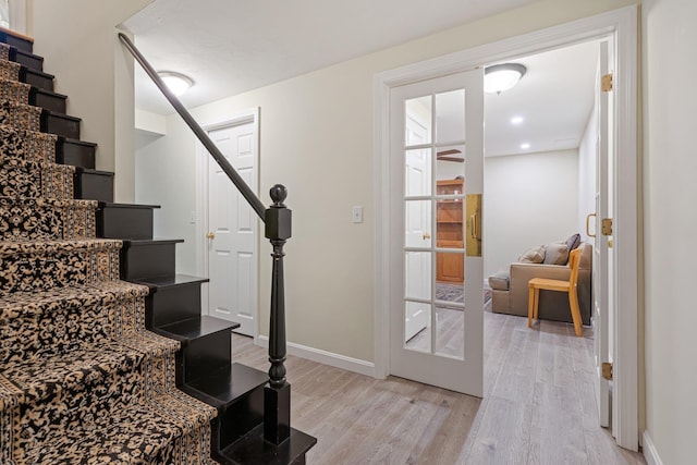 15 Fox Meadow Ln, Merrimack, NH 03054 - stairs with wood finished floors, baseboards, and french doors