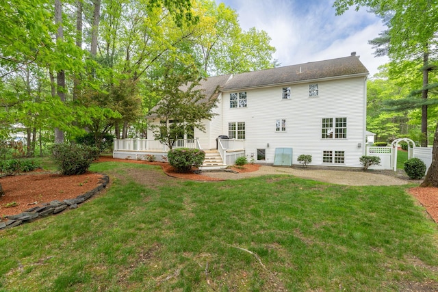 15 Fox Meadow Ln, Merrimack, NH 03054 - back of house featuring a deck and a gate