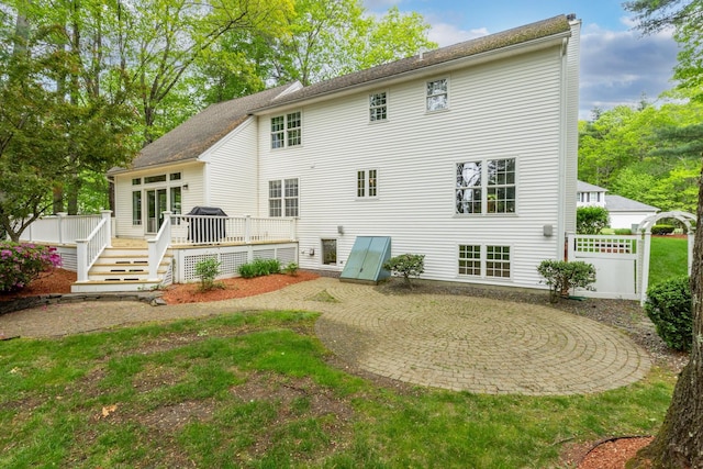 15 Fox Meadow Ln, Merrimack, NH 03054 - rear view of house with a deck