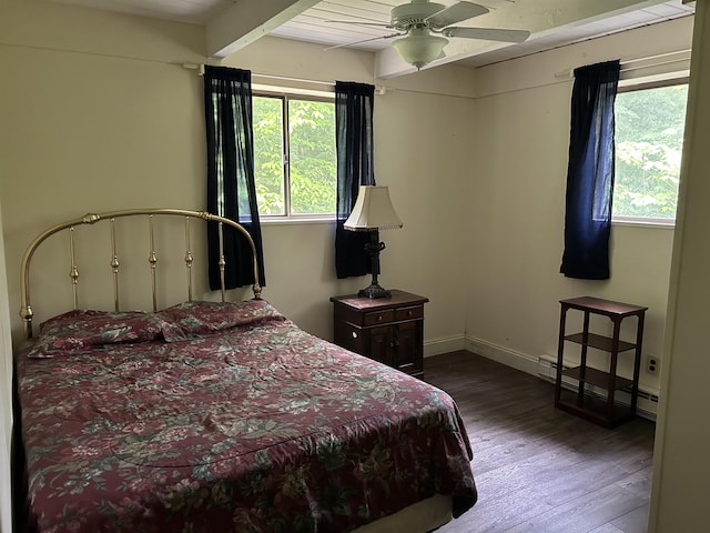 19 Alpendorf Loop, Bartlett, NH 03812 - bedroom with multiple windows, wood finished floors, baseboard heating, ceiling fan, and beam ceiling