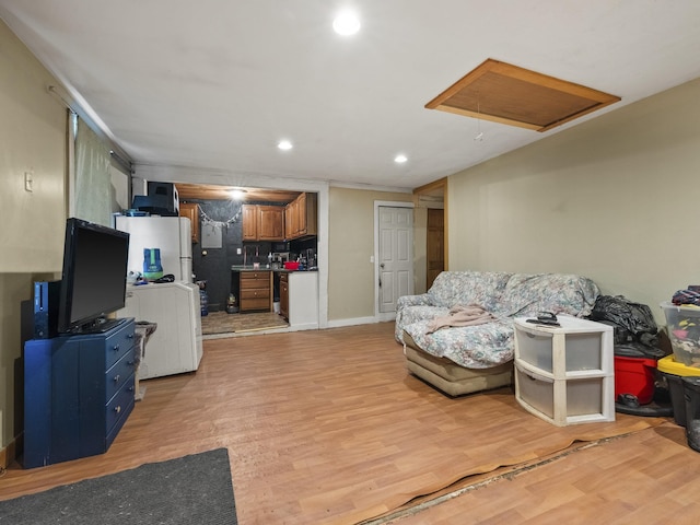 450 Leighton Corner Rd, Wakefield, NH 03872 - living area featuring light wood-style flooring, recessed lighting, attic access, and baseboards