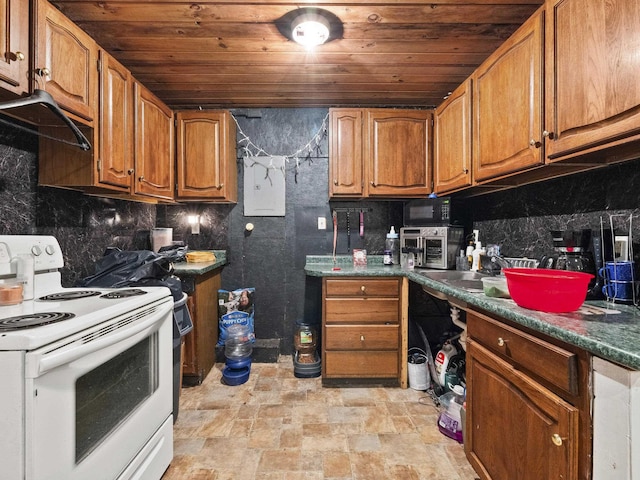 450 Leighton Corner Rd, Wakefield, NH 03872 - kitchen with white electric stove, wood ceiling, brown cabinetry, stone finish flooring, and dark countertops