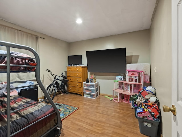 450 Leighton Corner Rd, Wakefield, NH 03872 - bedroom with wood finished floors and recessed lighting