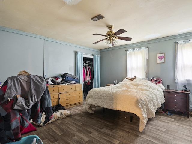 450 Leighton Corner Rd, Wakefield, NH 03872 - bedroom featuring multiple windows, wood finished floors, a closet, and a spacious closet