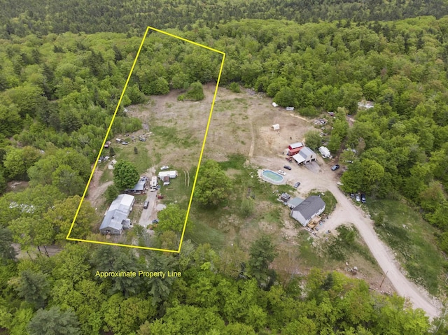 450 Leighton Corner Rd, Wakefield, NH 03872 - aerial view of property and surrounding area featuring a heavily wooded area and property parcel outlined