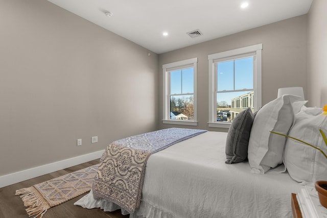 33 Little Bay Dr, Dover, NH 03820 - bedroom with baseboards, wood finished floors, and recessed lighting