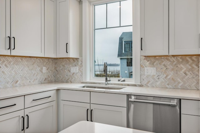 22 Little Bay Dr, Dover, NH 03820 - kitchen with dishwasher, a sink, tasteful backsplash, and light countertops