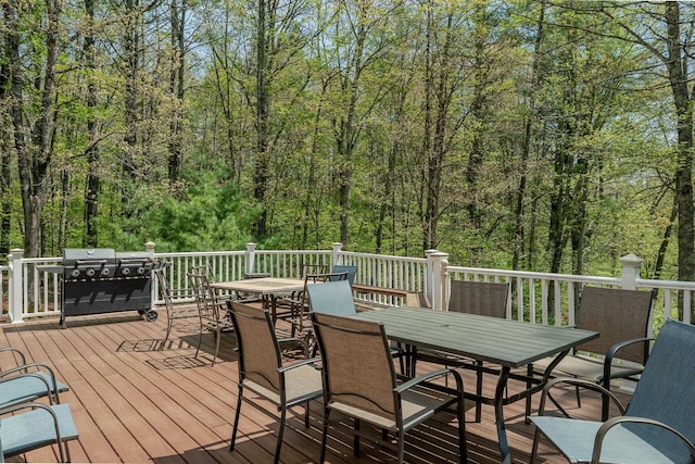 2 Alex Ct, Somersworth, NH 03878 - wooden terrace with outdoor dining space, grilling area, and a wooded view