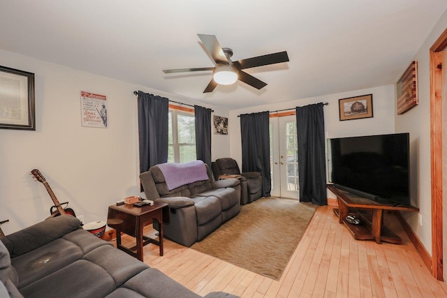 29 Isaac Frye Hwy, Wilton, NH 03086 - living room featuring a ceiling fan, healthy amount of natural light, french doors, and hardwood / wood-style floors