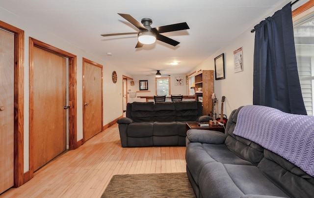 29 Isaac Frye Hwy, Wilton, NH 03086 - living room with ceiling fan and light wood-style floors