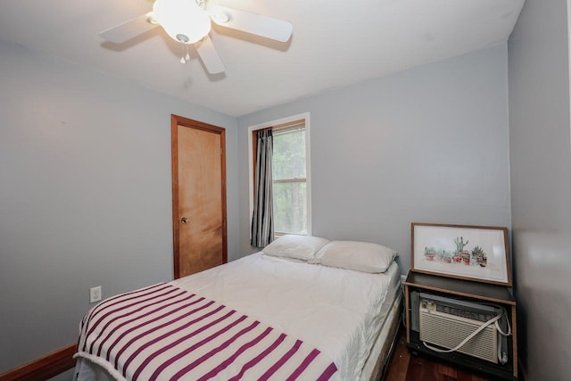 29 Isaac Frye Hwy, Wilton, NH 03086 - bedroom with an AC wall unit, a ceiling fan, and wood finished floors
