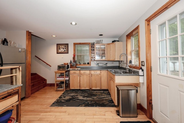 29 Isaac Frye Hwy, Wilton, NH 03086 - kitchen featuring a sink, light brown cabinetry, light wood-style floors, freestanding refrigerator, and recessed lighting