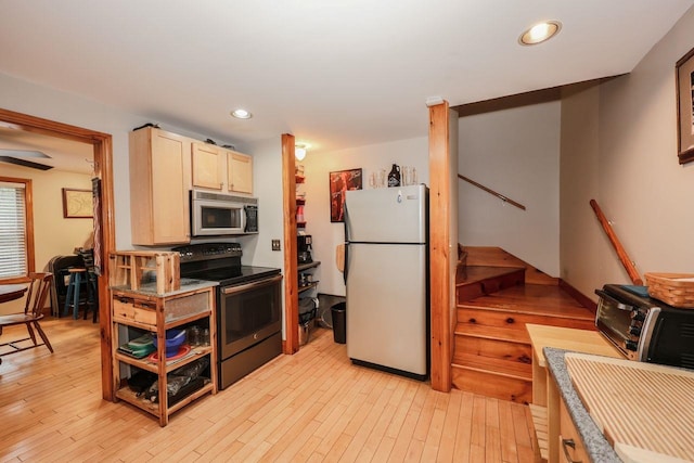 29 Isaac Frye Hwy, Wilton, NH 03086 - kitchen with stainless steel appliances, light brown cabinetry, light wood-style flooring, recessed lighting, and baseboards