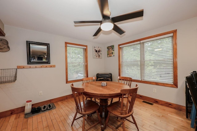 29 Isaac Frye Hwy, Wilton, NH 03086 - dining room with baseboards, light wood finished floors, and a ceiling fan