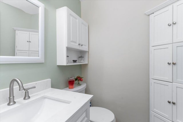 7 Daniel Plummer Rd Unit E, Goffstown, NH 03045 - half bathroom featuring toilet and vanity