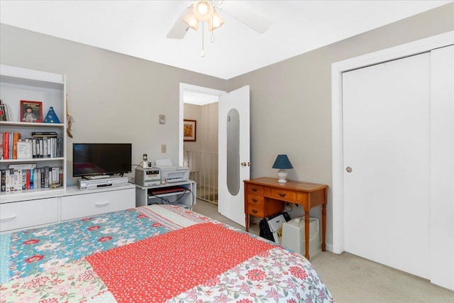 7 Daniel Plummer Rd Unit E, Goffstown, NH 03045 - bedroom featuring light carpet, a ceiling fan, and a closet