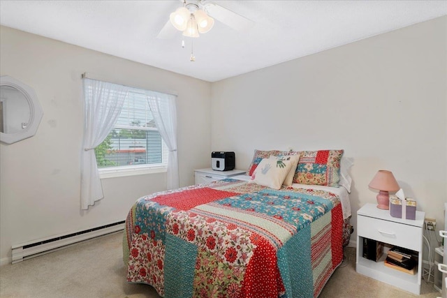 7 Daniel Plummer Rd Unit E, Goffstown, NH 03045 - carpeted bedroom featuring baseboard heating and a ceiling fan