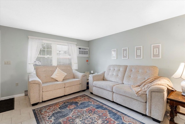7 Daniel Plummer Rd Unit E, Goffstown, NH 03045 - tiled living area with a wall unit AC and baseboards