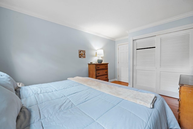 58 Branch Tpke Unit 69Aka A22, Concord, NH 03301 - bedroom featuring ornamental molding, wood finished floors, a closet, and baseboards