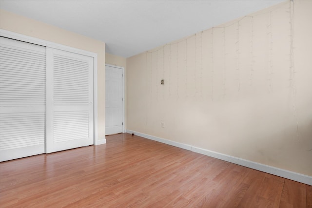 58 Branch Tpke Unit 69Aka A22, Concord, NH 03301 - unfurnished bedroom featuring light wood-style flooring, baseboards, and a closet
