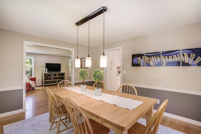 16 Pulpit Run, Amherst, NH 03031 - dining space with light wood finished floors and baseboards