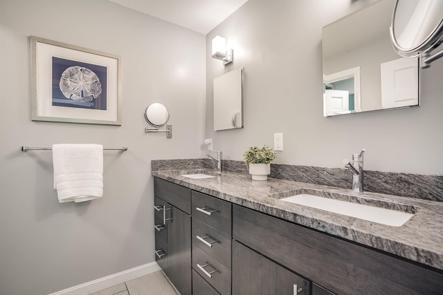 16 Pulpit Run, Amherst, NH 03031 - bathroom featuring baseboards, double vanity, and tile patterned floors
