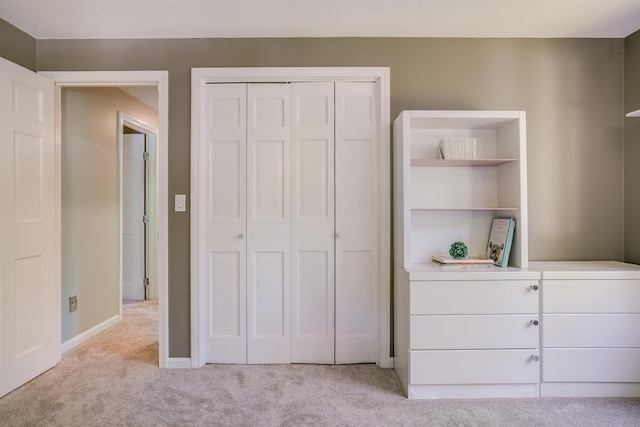 16 Pulpit Run, Amherst, NH 03031 - unfurnished bedroom featuring carpet floors, a closet, and baseboards